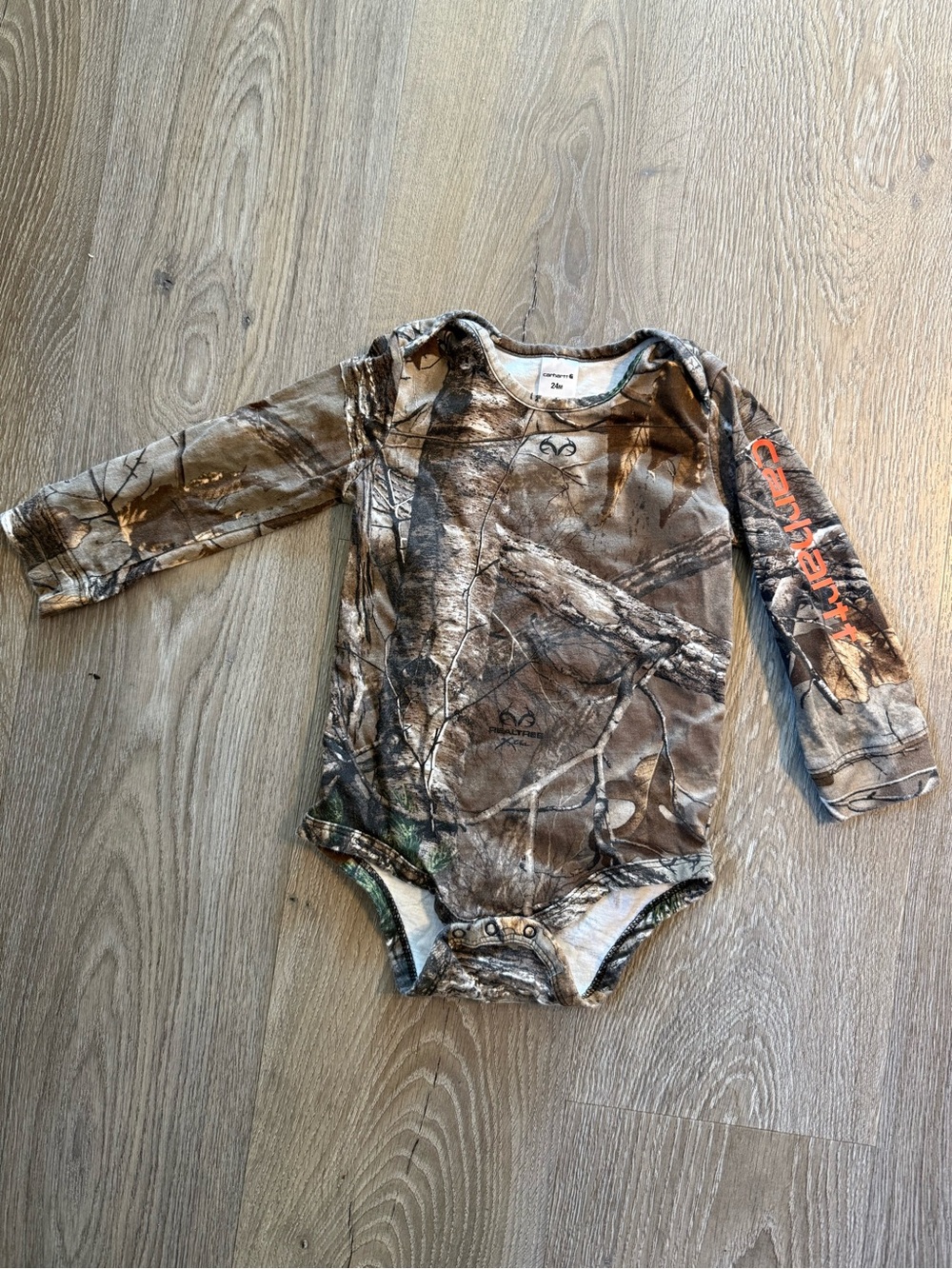 Carhartt Brown Camo Long Sleeve Baby Bodysuit with Orange Logo